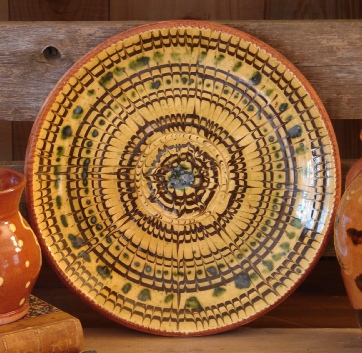 feathered slipware redware plate by Pied Potter Hamelin